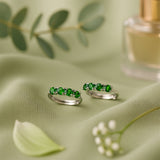 AG Collective Jewelry – Emerald Gleam Huggies