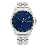 A Tommy Hilfiger Norris men's stainless steel watch with a blue dial and silver bracelet.