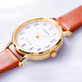 CITIZEN EM0578-17A ECO-DRIVE GOLD STAINLESS STEEL BROWN LEATHER STRAP WOMEN'S WATCH