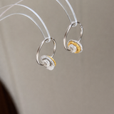 AG Collective Jewelry – Infinite Twist Hoop Earrings (Two-Tone Gold & Silver)