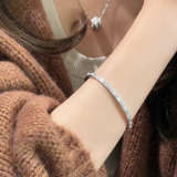 AG Collective Jewelry – Fleur d’Élégance Silver Bangle