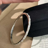 AG Collective Jewelry – Fleur d’Élégance Silver Bangle