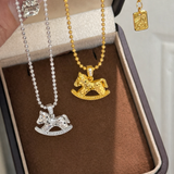 AG Collective Jewelry – Golden Heirloom Rocking Horse Necklace