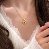 AG Collective Jewelry – Golden Heirloom Rocking Horse Necklace