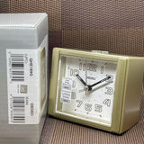 SEIKO QHE189GN QUIET SWEEP SNOOZE LIGHT LUMIBRITE METALLIC GOLD BESIDE BED ALARM CLOCK